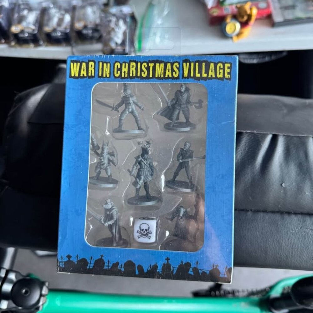 War in Christmas village figurines